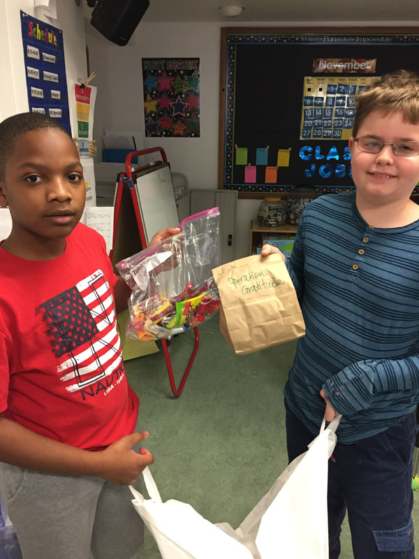 students collecting candy