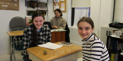 two female students talking (2)